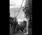 Wires and Woman in Laneway
