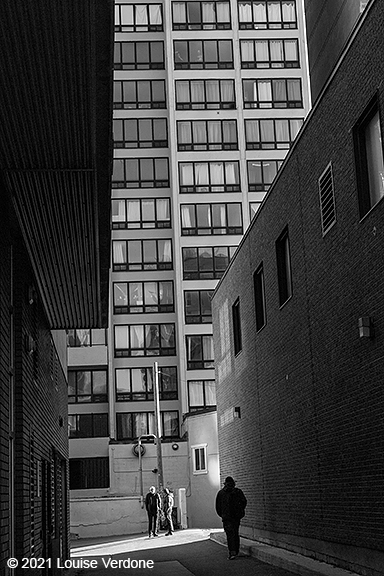 In a Skyscraper Back Alley